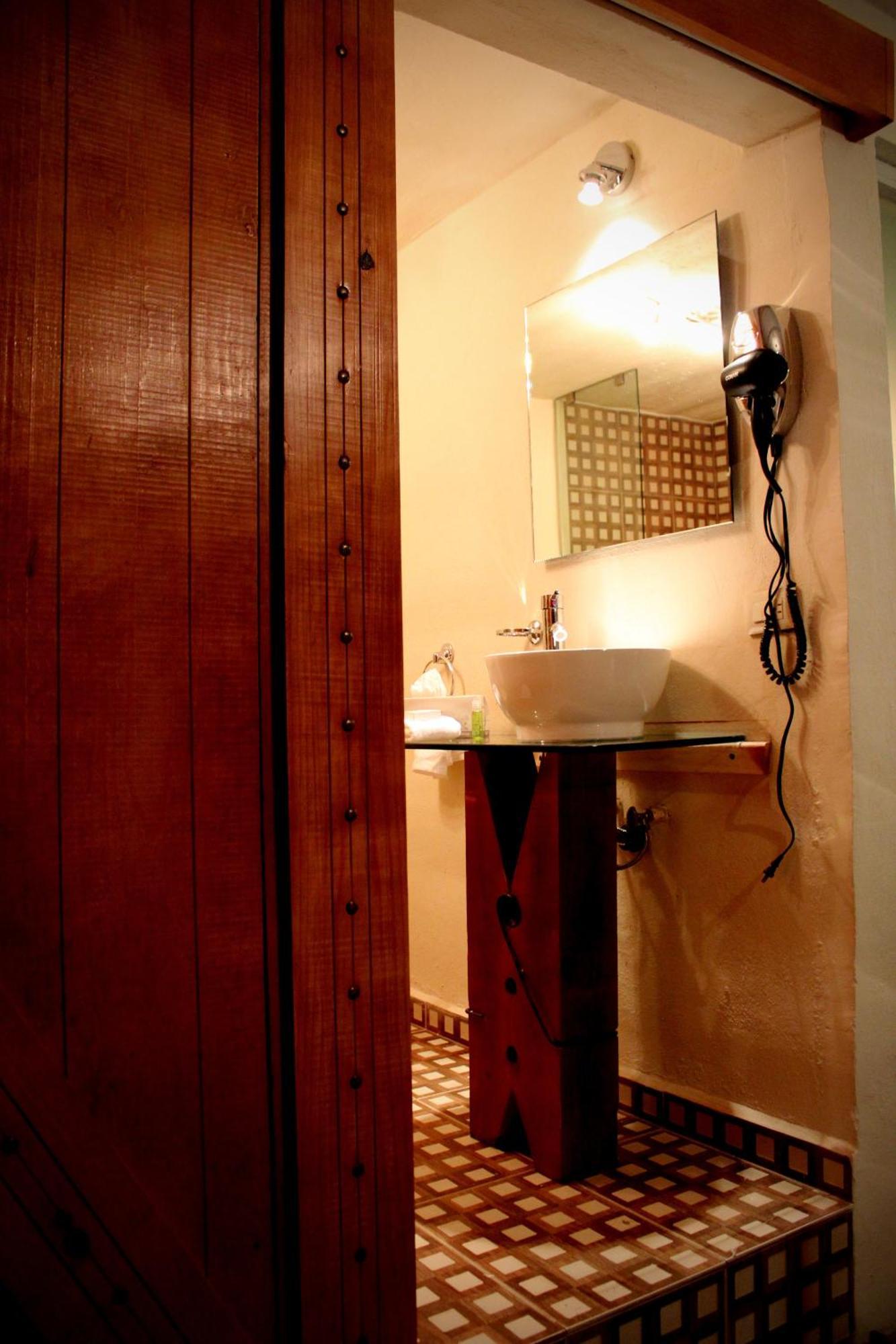 Hotel Damiana Boutique Керетаро Номер фото